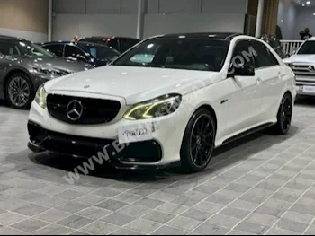Mercedes-Benz  E-Class  500  2014  Sedan  Automatic  8  95,000  RWD  White  Gasoline