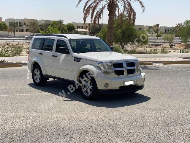 دودج  نترو  2009  اس يو في  اتوماتك  6  136,600  دفع رباعي  أبيض  بنزين