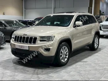 Jeep  Laredo  2014  SUV  Automatic  6  138,000  4WD  Beige  Gasoline