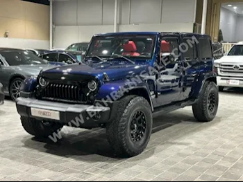 Jeep  Wrangler  Sahara  2013  SUV  Automatic  6  130,000  4WD  Dark Blue  Gasoline