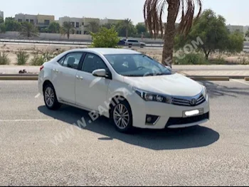 Toyota  Corolla  GLI  2014  Sedan  Automatic  4  284,350  FWD  Pearl  Gasoline