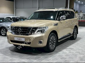 Nissan  Patrol  Platinum  2015  SUV  Automatic  8  215,000  4WD  Gold  Gasoline
