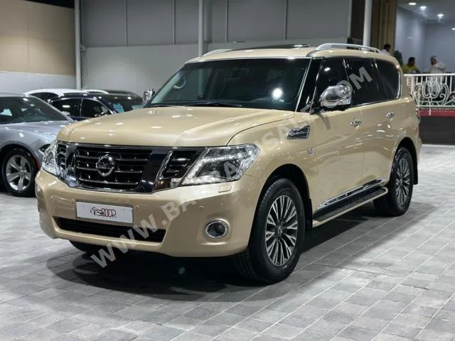 Nissan  Patrol  Platinum  2015  SUV  Automatic  8  215,000  4WD  Gold  Gasoline