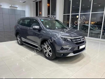 Honda  Pilot  2016  SUV  Automatic  6  109,450  AWD  Gray  Gasoline