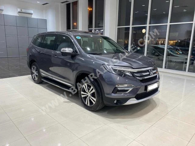 Honda  Pilot  2016  SUV  Automatic  6  109,450  AWD  Gray  Gasoline