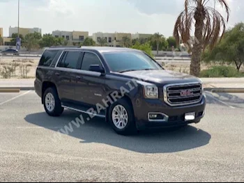 GMC  Yukon  SLE  2015  SUV  Automatic  8  179,300  RWD  Gray  Gasoline