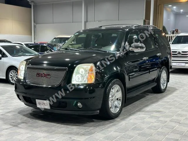 GMC  Yukon  SLT  2012  SUV  Automatic  8  125,000  4WD  Black  Gasoline
