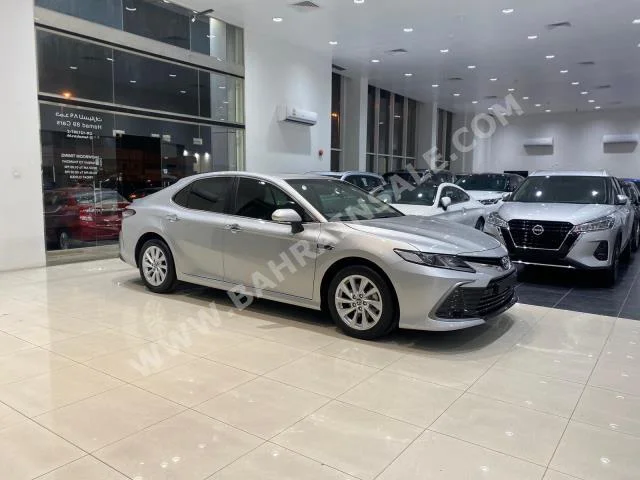 Toyota  Camry  GLE  2023  Sedan  Automatic  4  30  FWD  Silver  Gasoline
