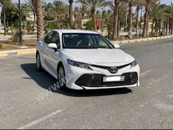 Toyota  Camry  LE  2019  Sedan  Automatic  4  138,600  FWD  White  Gasoline