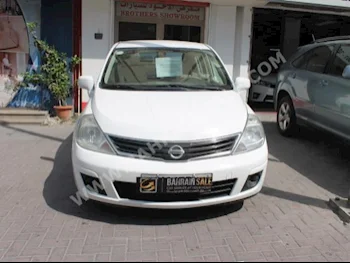 Nissan  Tiida  2013  Hatchback  Automatic  4  93,000  FWD  White  Gasoline