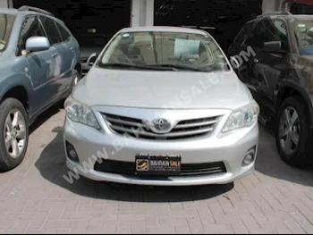 Toyota  Corolla  XLI  2013  Sedan  Automatic  4  90,000  FWD  Silver  Gasoline
