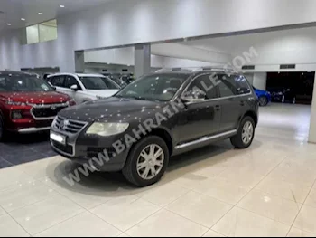 Volkswagen  Touareg  2009  SUV  Automatic  6  200,000  RWD  Gray  Gasoline