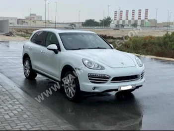 Porsche  Cayenne  Platinum  2014  SUV  Automatic  6  128,850  AWD  White  Gasoline