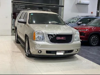GMC  Yukon  2014  SUV  Automatic  8  250,600  RWD  Beige  Gasoline