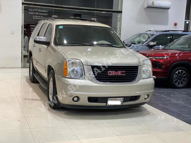 GMC  Yukon  2014  SUV  Automatic  8  250,600  RWD  Beige  Gasoline