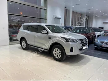 Nissan  Xterra  2022  SUV  Automatic  4  24,600  RWD  Silver  Gasoline