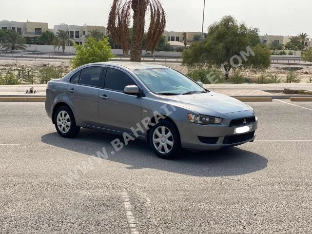 Mitsubishi  Lancer  EX  2012  Sedan  Automatic  4  266,500  FWD  Gray  Gasoline
