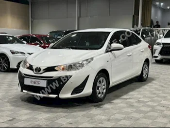 Toyota  Yaris  2019  Sedan  Automatic  4  65,000  FWD  White  Gasoline