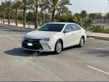 Toyota  Camry  GLX  2016  Sedan  Automatic  4  148,250  FWD  Pearl  Gasoline