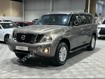 Nissan  Patrol  XE  2014  SUV  Automatic  8  150,000  4WD  Bronze  Gasoline