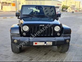 Jeep  Wrangler  Sahara  2012  SUV  Automatic  6  272  4WD  Black  Gasoline