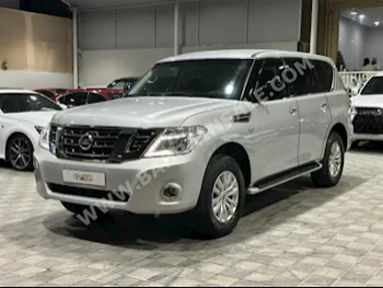 Nissan  Patrol  XE  2015  SUV  Automatic  8  180,000  4WD  Silver  Gasoline
