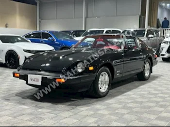 Nissan  Z  280 ZX  1982  Coupe / Sport  Manual  6  114,000  RWD  Black  Gasoline