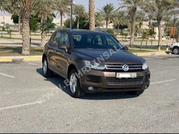 فوكس واغن  طوارق  2014  اس يو في  اتوماتك  6  247,300  دفع كلي مستمر  بني  بنزين