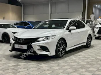 Toyota  Camry  SE  2020  Sedan  Automatic  6  110,000  FWD  White  Gasoline