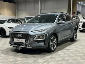 Hyundai  Kona  SE  2019  SUV  Automatic  4  80,000  AWD  Gray  Gasoline