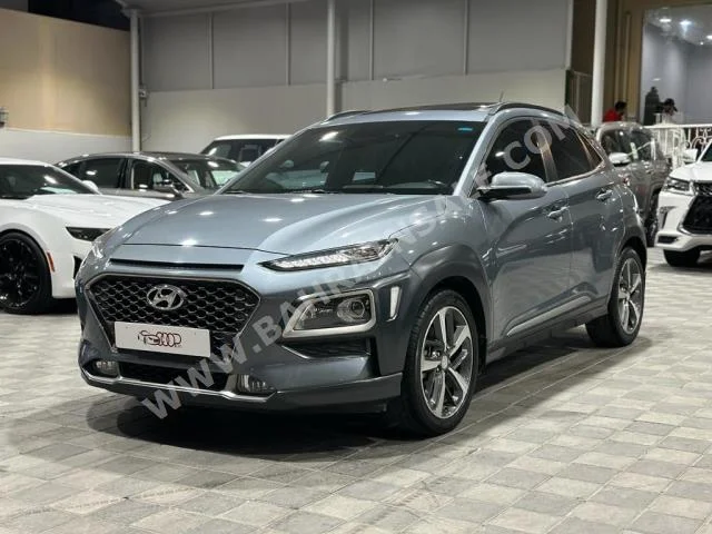 Hyundai  Kona  SE  2019  SUV  Automatic  4  80,000  AWD  Gray  Gasoline