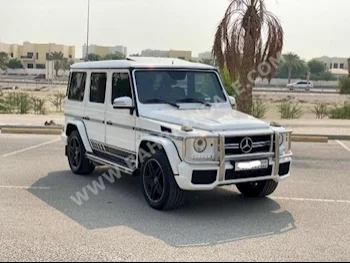 مرسيدس - بنز  جي - كلاس  63 AMG  2016  اس يو في  اتوماتك  8  113,600  دفع رباعي  أبيض  بنزين