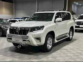 Toyota  Prado  TXL  2019  Sedan  Automatic  6  95,000  4WD  White  Gasoline