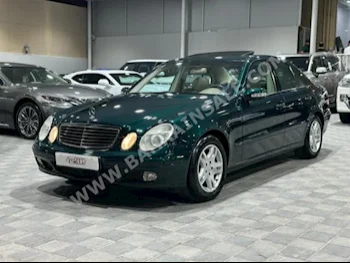 Mercedes-Benz  E-Class  240  2005  Sedan  Automatic  6  145,000  RWD  Green  Gasoline