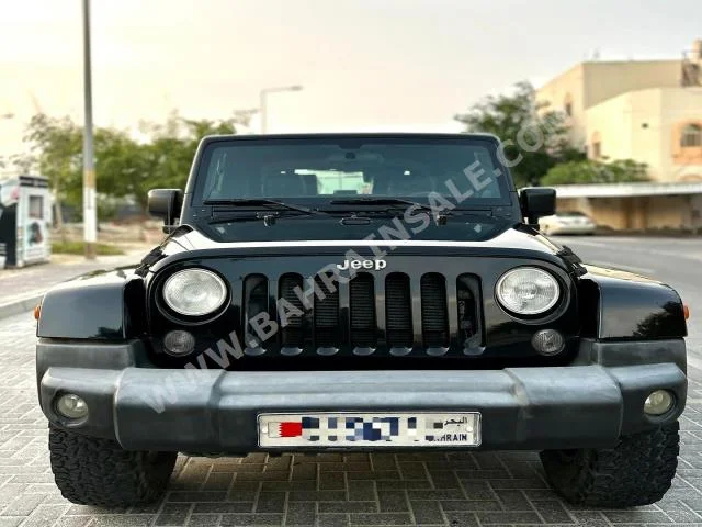 Jeep  Wrangler  Sahara  2012  SUV  Automatic  6  272  4WD  Black  Gasoline
