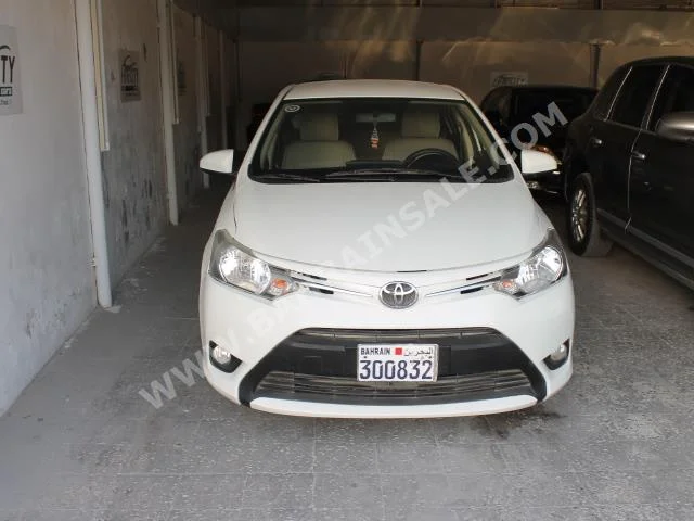 Toyota  Yaris  2014  Sedan  Automatic  4  68,000  FWD  White  Gasoline
