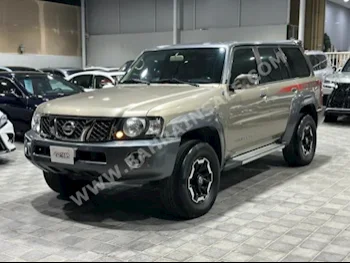 Nissan  Patrol  Super Safari  2019  SUV  Manual  6  117,000  4WD  Gold  Gasoline