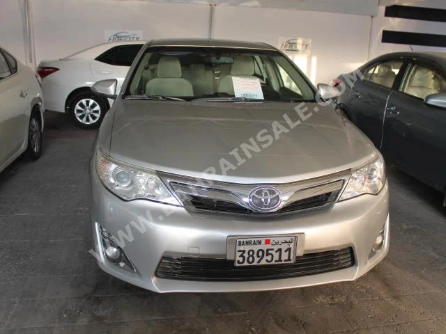 Toyota  Camry  GLX  2014  Sedan  Automatic  4  81,000  FWD  Silver  Gasoline