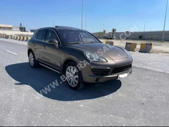 Porsche  Cayenne  2011  SUV  Automatic  6  209,300  RWD  Brown  Gasoline