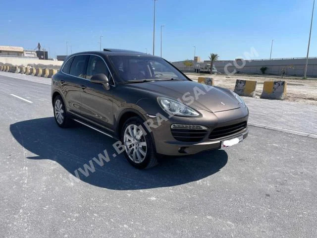 Porsche  Cayenne  2011  SUV  Automatic  6  209,300  RWD  Brown  Gasoline