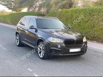 BMW  X-Series  5  2014  SUV  Automatic  8  100,100  AWD  Gray  Gasoline
