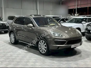 Porsche  Cayenne  2011  SUV  Automatic  6  200,000  4WD  Brown  Gasoline