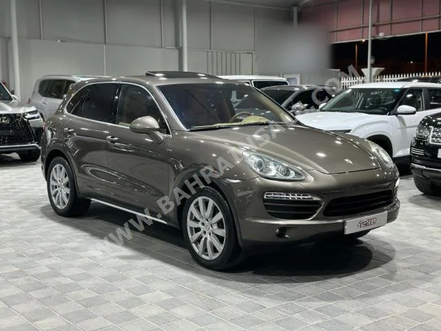Porsche  Cayenne  2011  SUV  Automatic  6  200,000  4WD  Brown  Gasoline