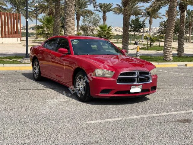 Dodge  Charger  2013  Sedan  Automatic  6  183,850  RWD  Red  Gasoline