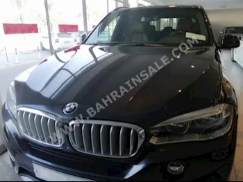 BMW  X-Series  5  2014  SUV  Automatic  8  49,000  AWD  Gray  Gasoline