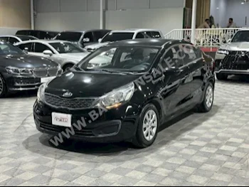 Kia  Rio  2015  Sedan  Automatic  4  145,000  FWD  Black  Gasoline
