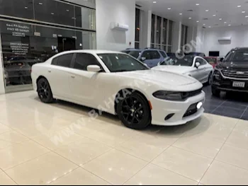 Dodge  Charger  2015  Sedan  Automatic  6  155,000  RWD  White  Gasoline