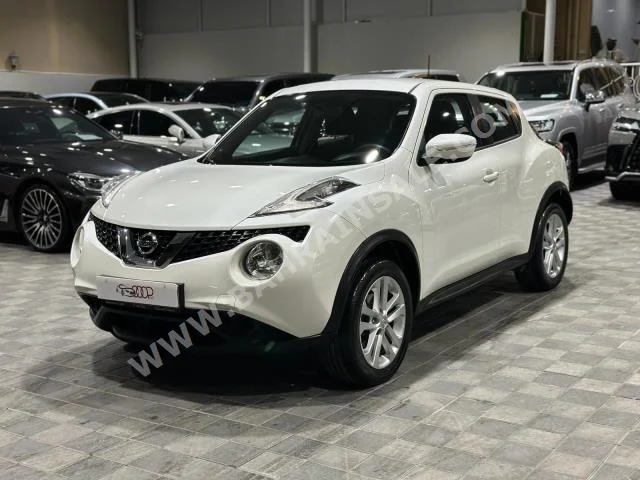 Nissan  Juke  2017  Hatchback  Automatic  4  90,000  FWD  White  Gasoline