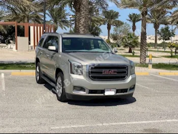 GMC  Yukon  2015  SUV  Automatic  8  296,850  RWD  Beige  Gasoline