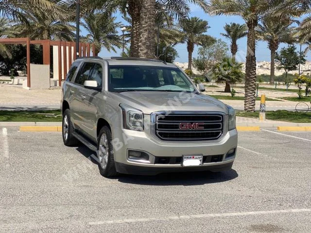 GMC  Yukon  2015  SUV  Automatic  8  296,850  RWD  Beige  Gasoline
